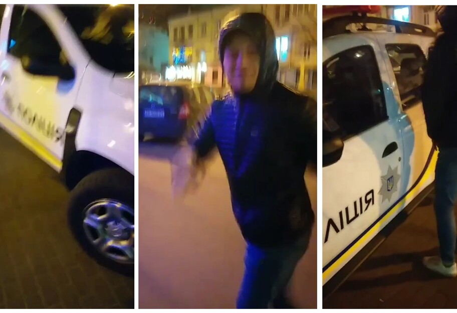 В Киеве парень помочился на полицейский автомобиль - видео - фото 1