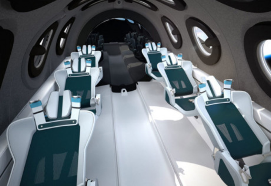Космический комфорт - Virgin Galactic показала интерьеры своего корабля для полетов в космос - фото 1