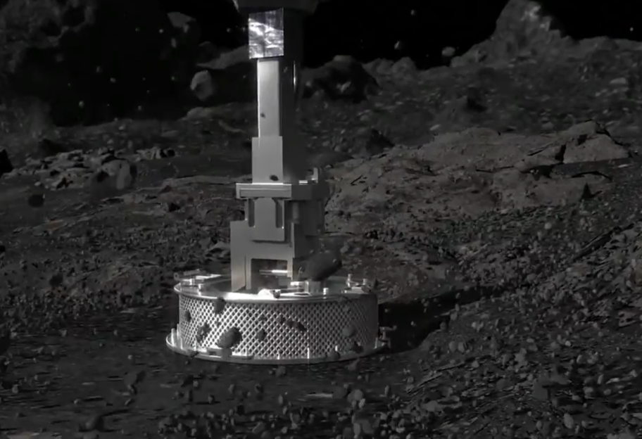 Забрав зразки з астероїда: зонда NASA опустився на поверхню Бенну - відео - фото 1