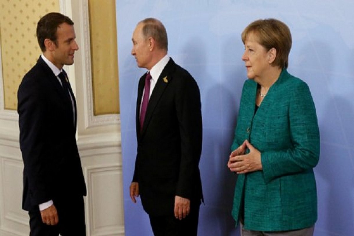 Эммануэль Макрон, Владимир Путин и Ангела Меркель / Источник: 24tv.ua