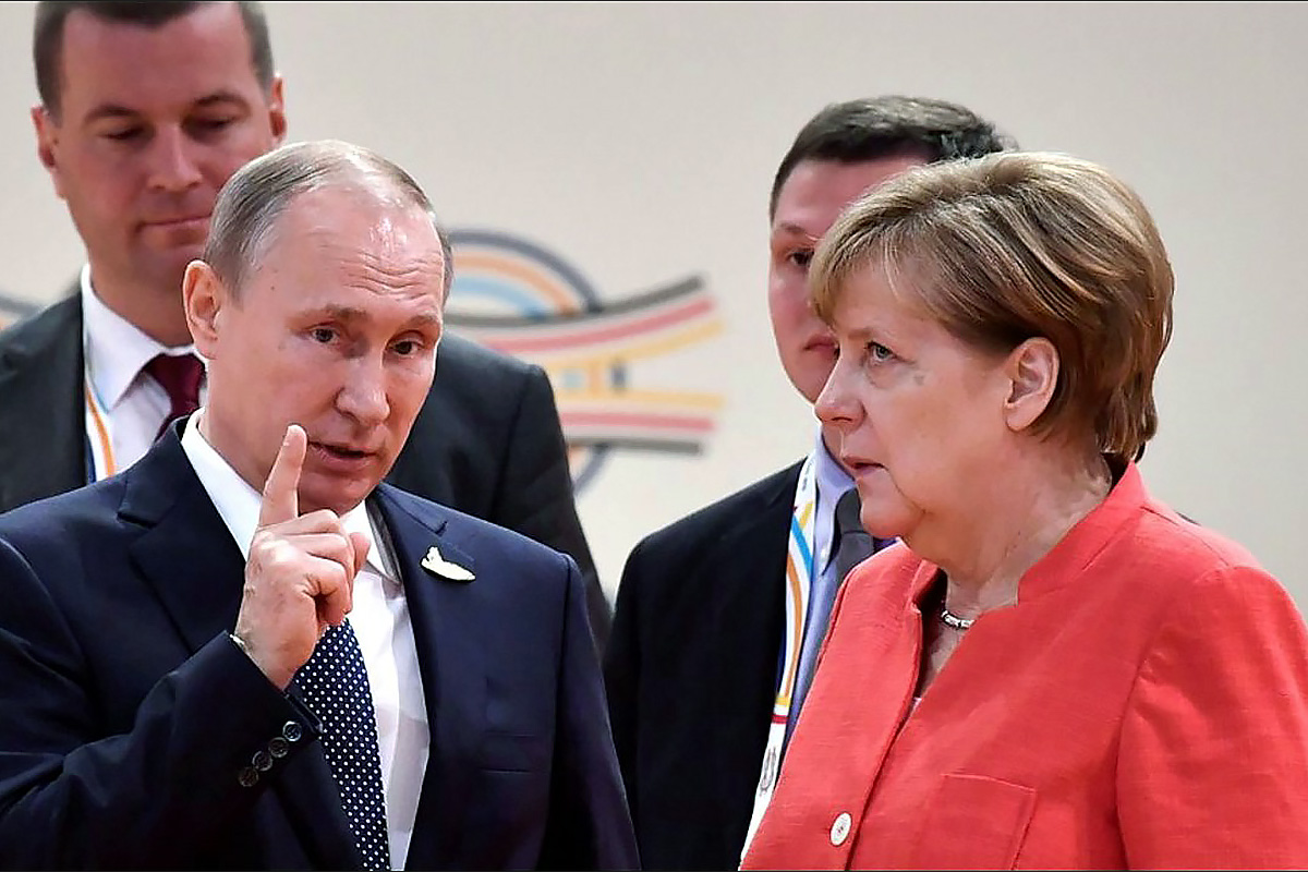 Владимир Путин и Ангела Меркель / Источник: youtube.com
